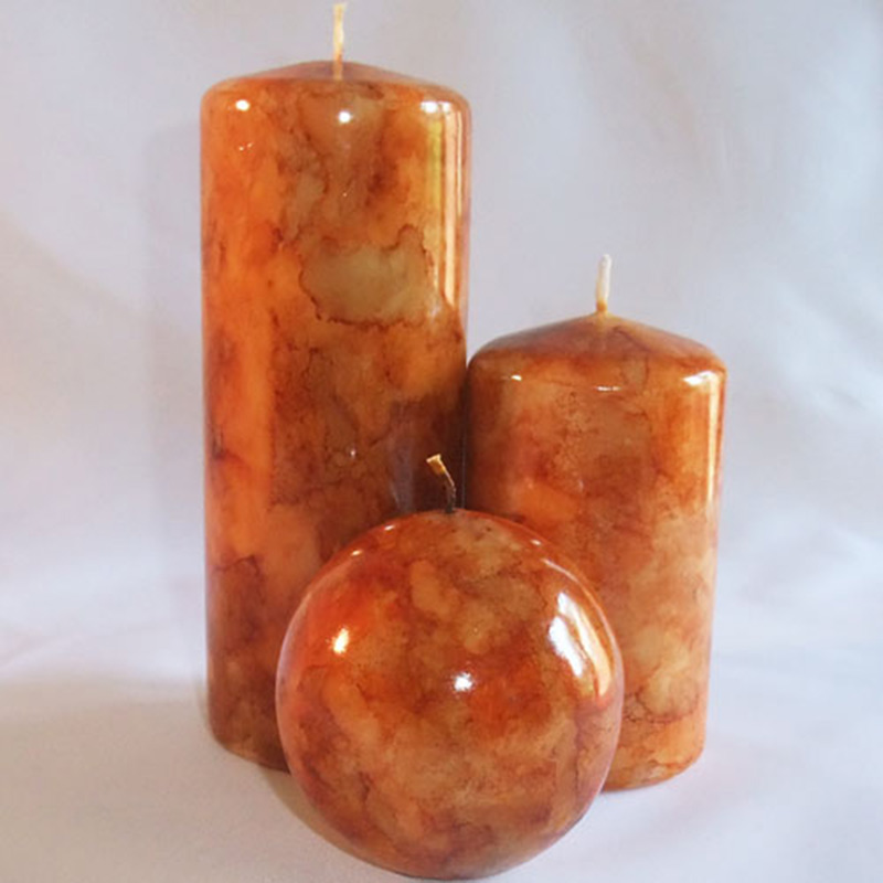 Burnt orange coloured marble Pillar candle set Justcandles.co.uk