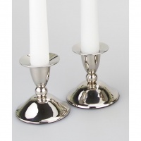 Candle stick holders with a plain turned finish