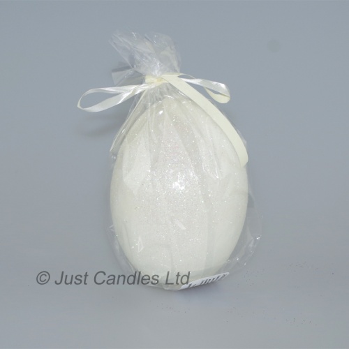 Egg shaped glittery white candle