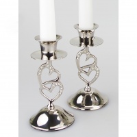 Candle stick holders with entwined hearts stem